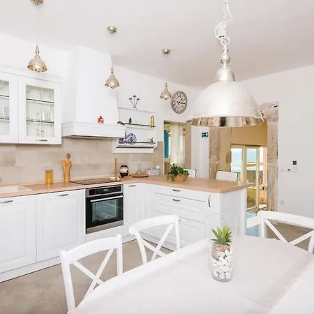 Three-bedroom In Hébergement de vacances